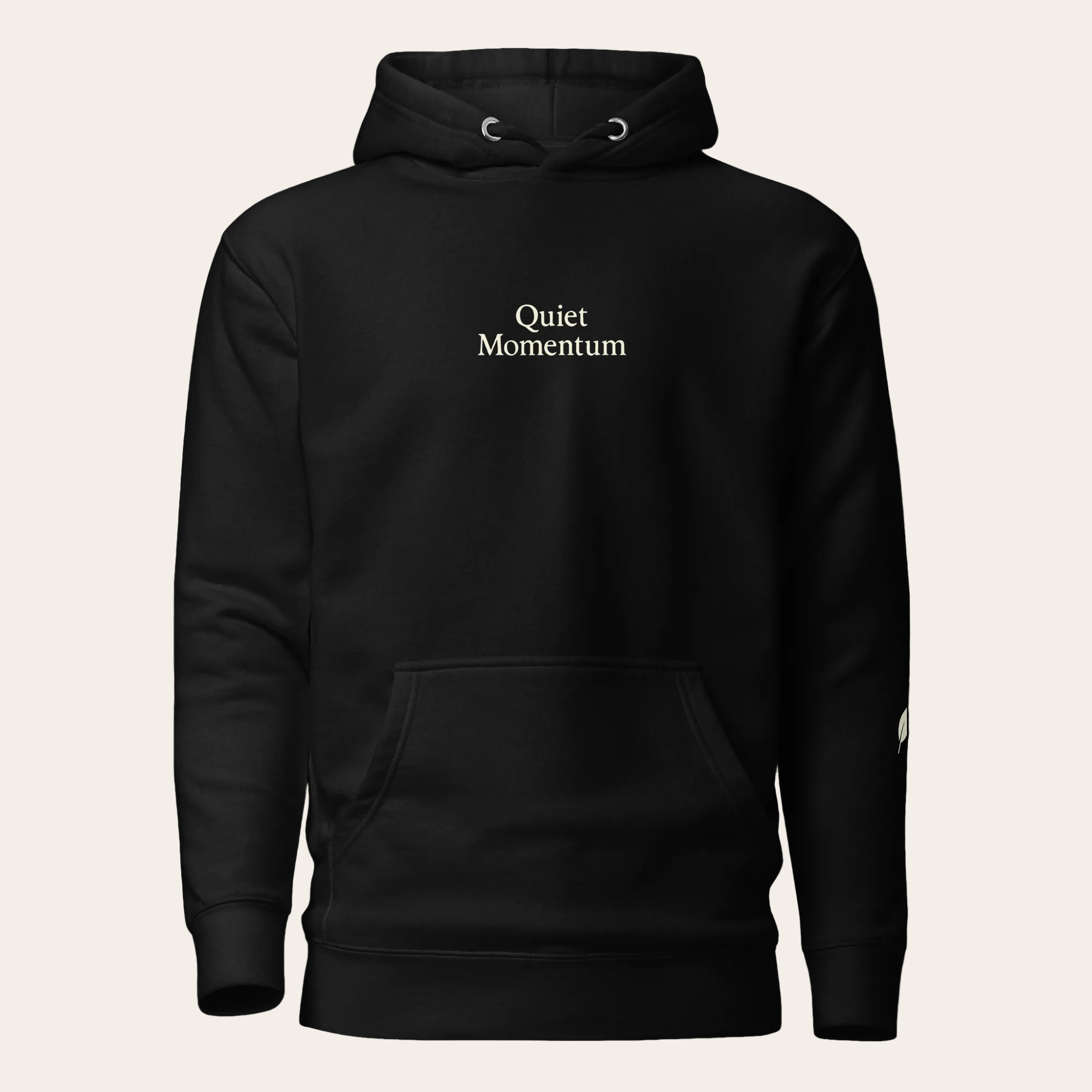 Black hoodie with 'Quiet Momentum' text on a white background