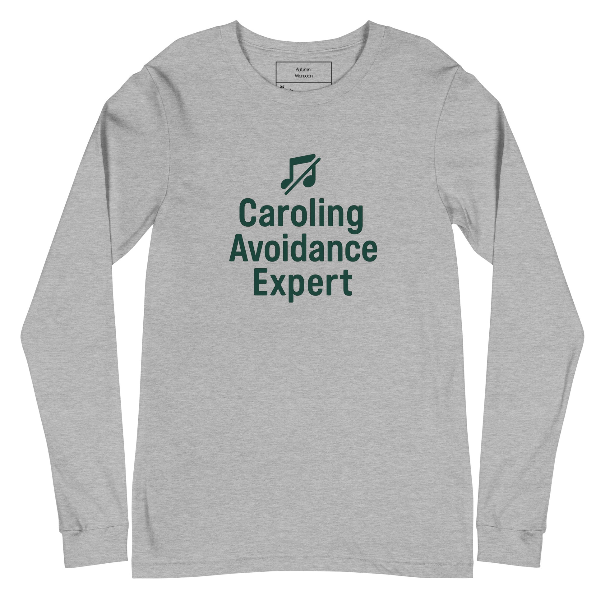 Gray long-sleeve shirt with 'Caroling Avoidance Expert' text and music note icon on a white background