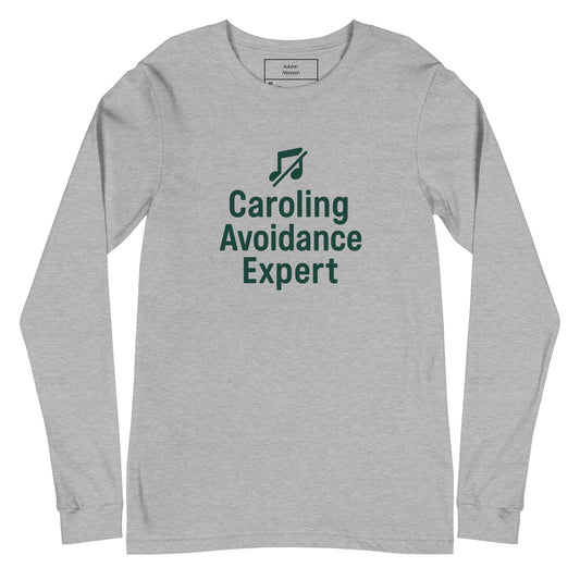 Gray long-sleeve shirt with 'Caroling Avoidance Expert' text and music note icon on a white background