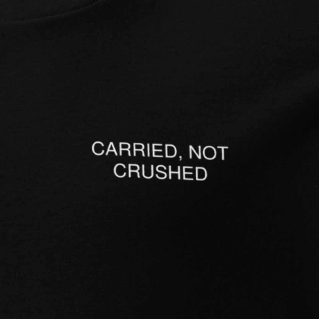 Close up of CARRIED, NOT CRUSHED design