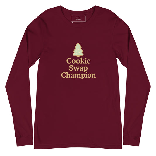 Maroon long-sleeve shirt with 'Cookie Swap Champion' text and tree graphic on a white background
