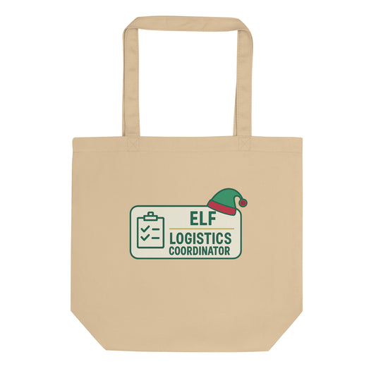 Beige tote bag with 'Elf Logistics Coordinator' design on a white background
