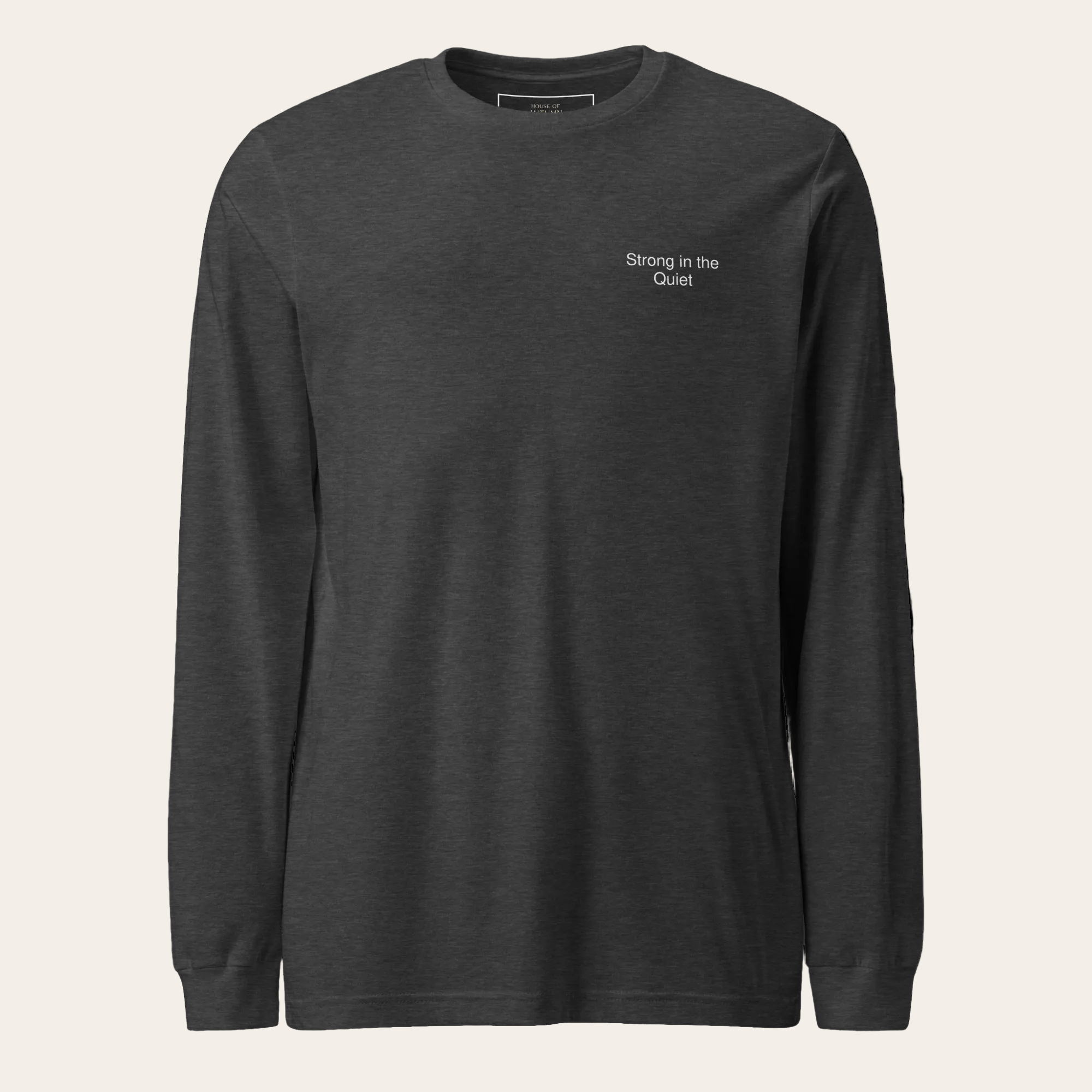 Charcoal long sleeve tee with Strong in the Quiet on the upper left chest.