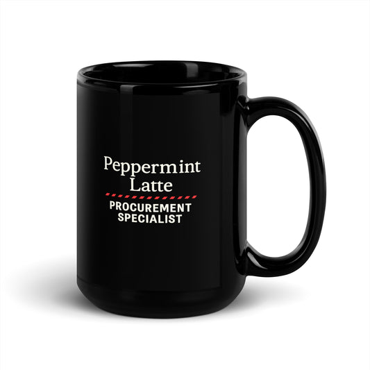 Black mug with 'Peppermint Latte Procurement Specialist' text on a white background