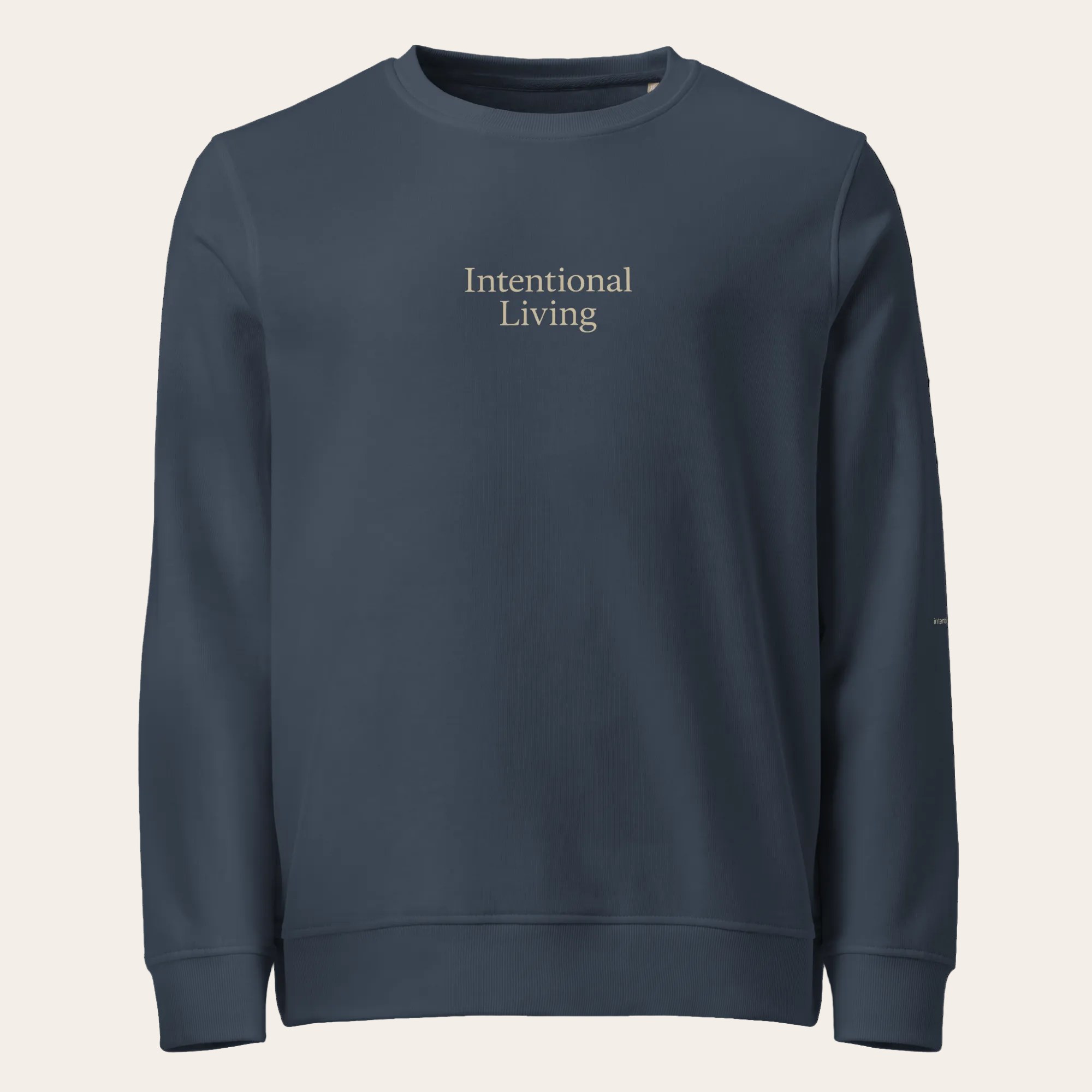 Navy blue sweatshirt with the words Intentional Living on the front.