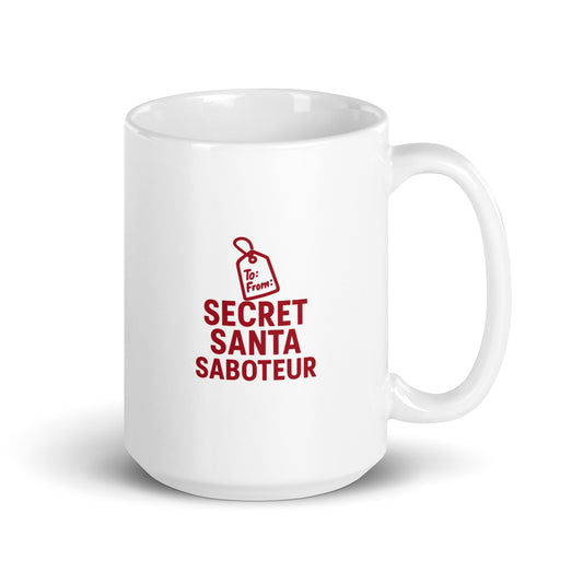 White mug with red text 'SECRET SANTA SABOTEUR' on a white background