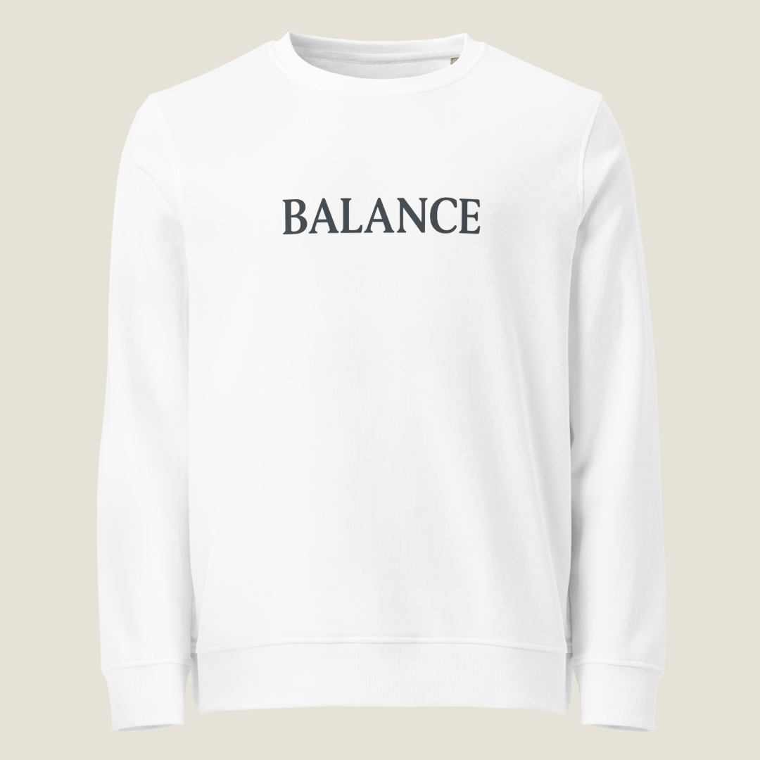 White crewneck sweatshirt with "BALANCE" across the chest.