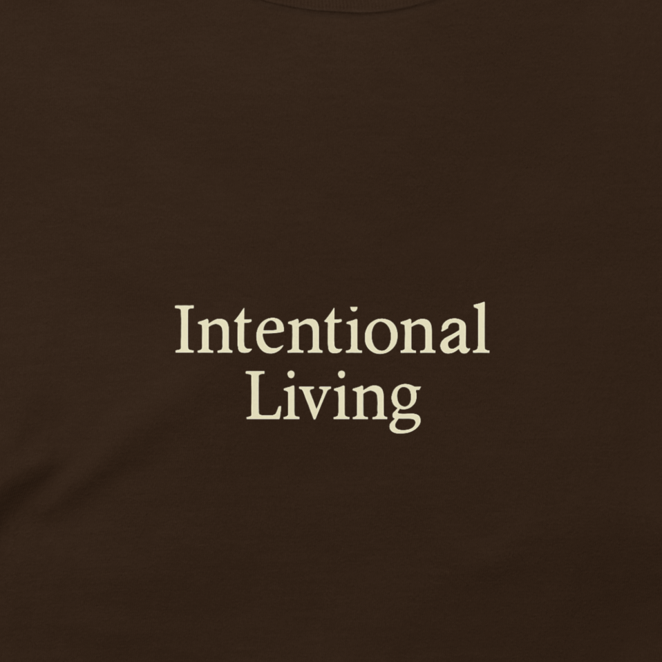 Brown t-shirt with 'Intentional Living' text on a white background