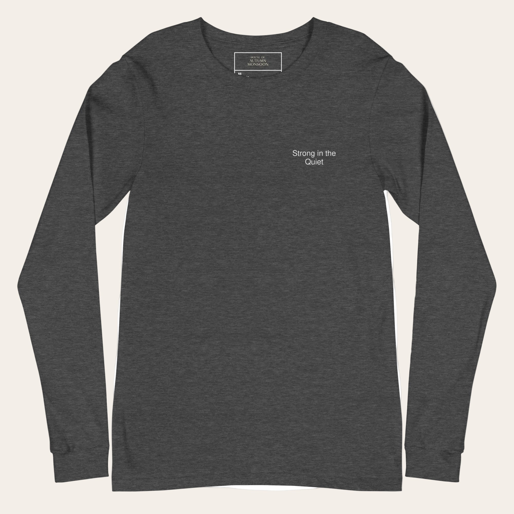 Dark gray long-sleeve shirt with 'Strong in the Quiet' text on a white background