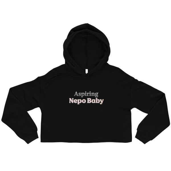 Black hoodie with 'Aspiring Nepo Baby' text on a white background