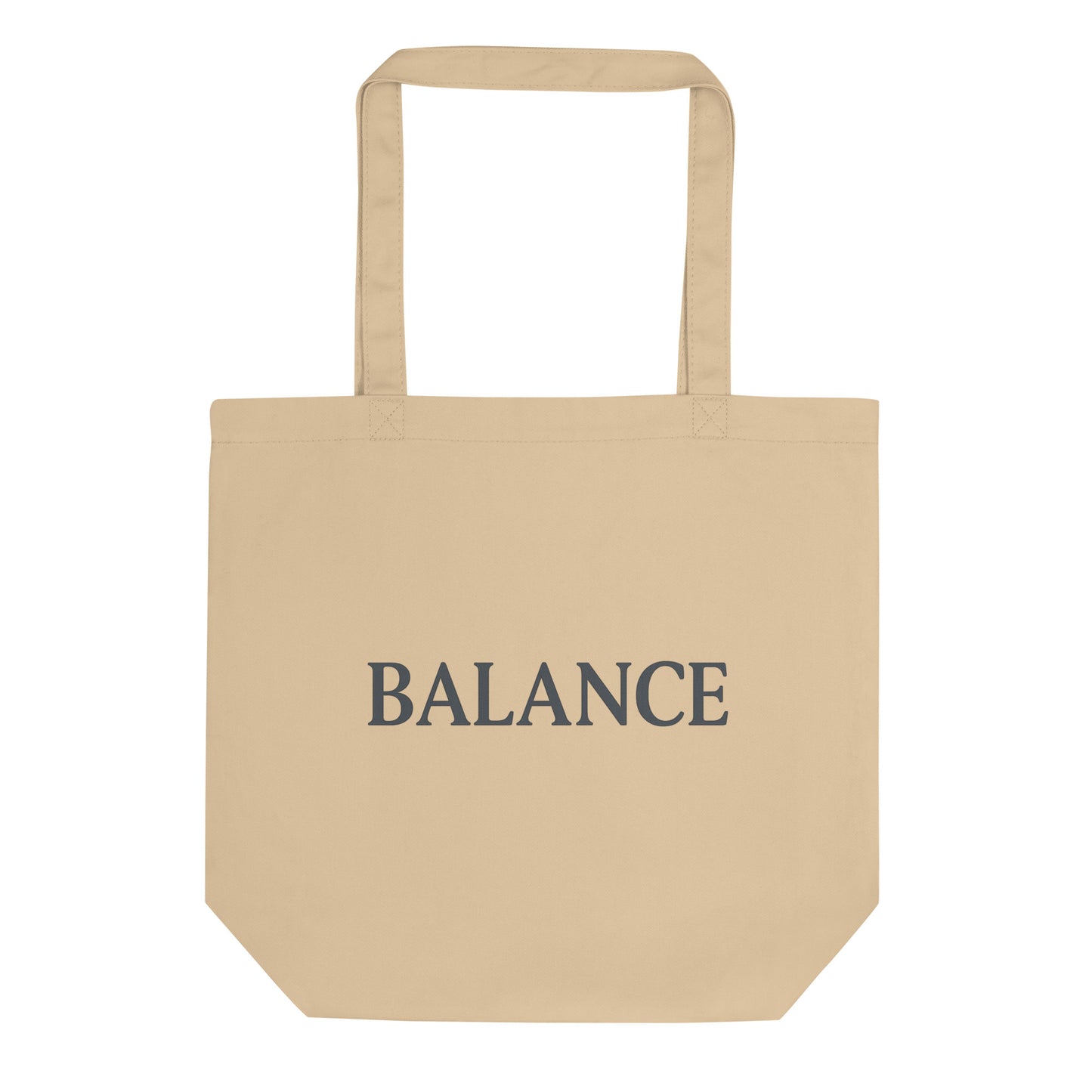 Beige tote bag with 'BALANCE' text on a white background