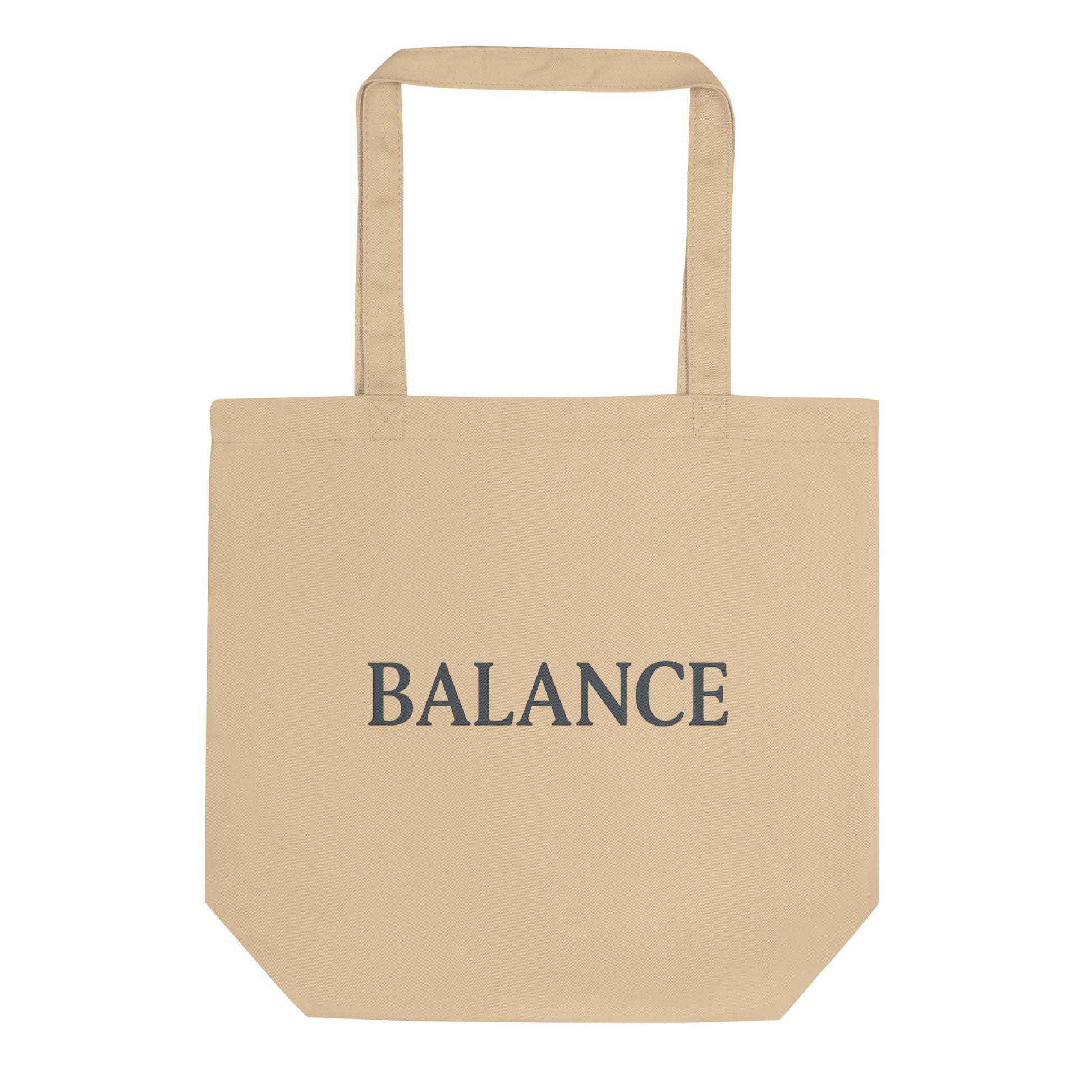 Beige tote bag with 'BALANCE' text on a white background