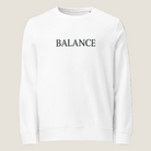White crewneck sweatshirt with the word Balance across the chest.