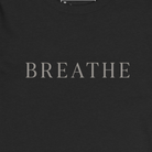 The word "Breathe" on a black background