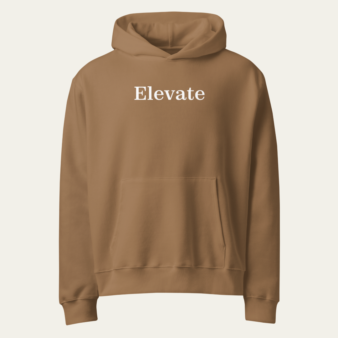 Vintage khaki hoodie with "Elevate" text on the chest.