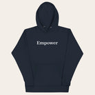 Navy blue hoodie with 'Empower' text on a white background