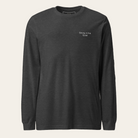 Charcoal long sleeve tee with Strong in the Quiet on the upper left chest.