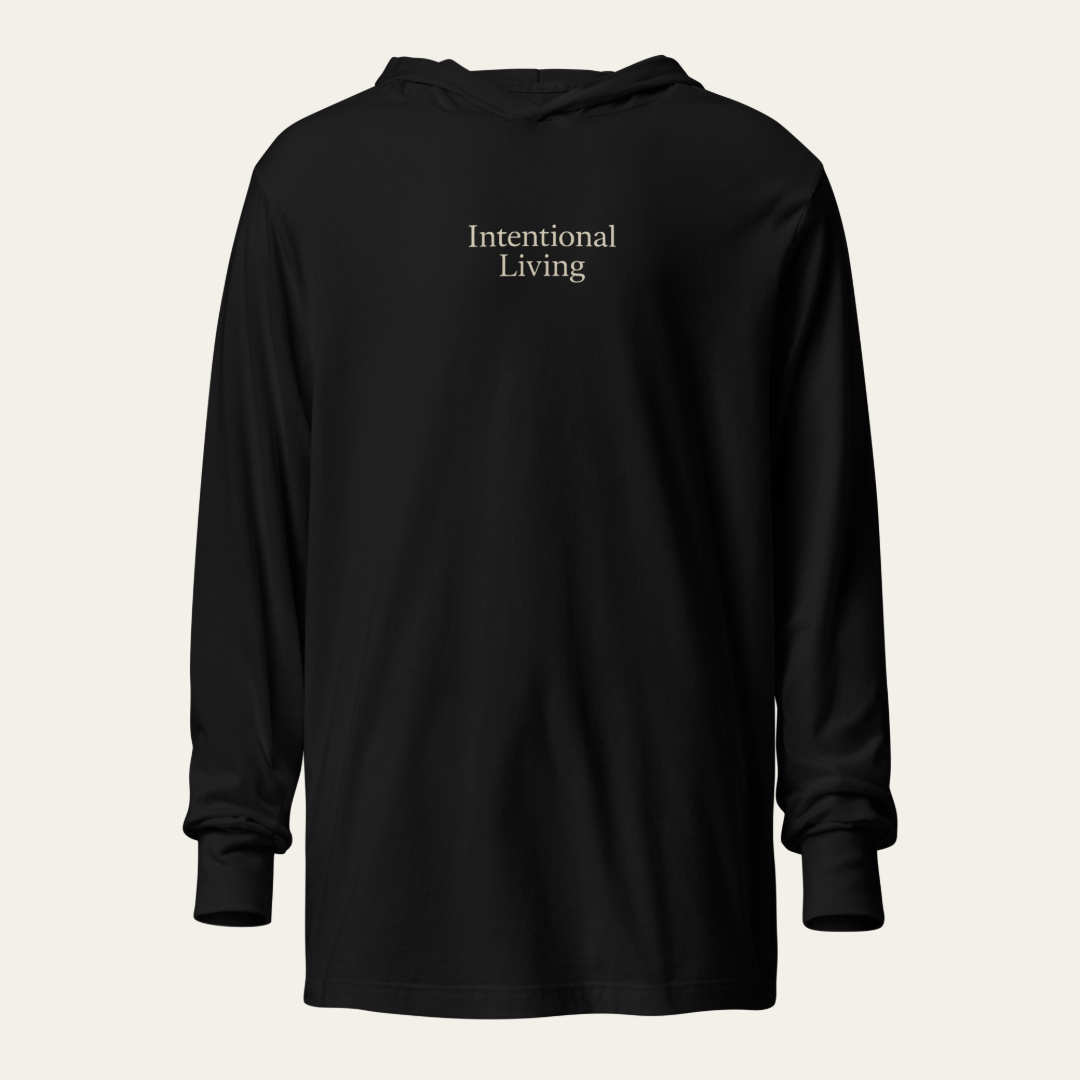 Black hooded long sleeve tee with the saying Intentional Living