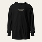 Black hooded long sleeve tee with the saying Intentional Living