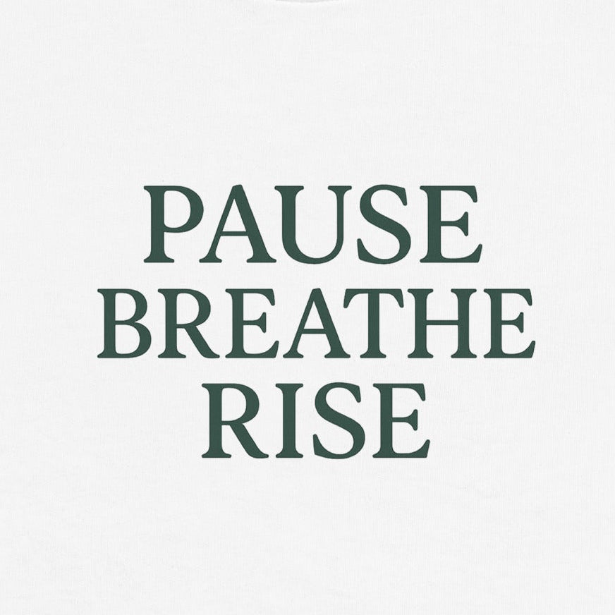 White sweatshirt with 'PAUSE BREATHE RISE' text on a white background