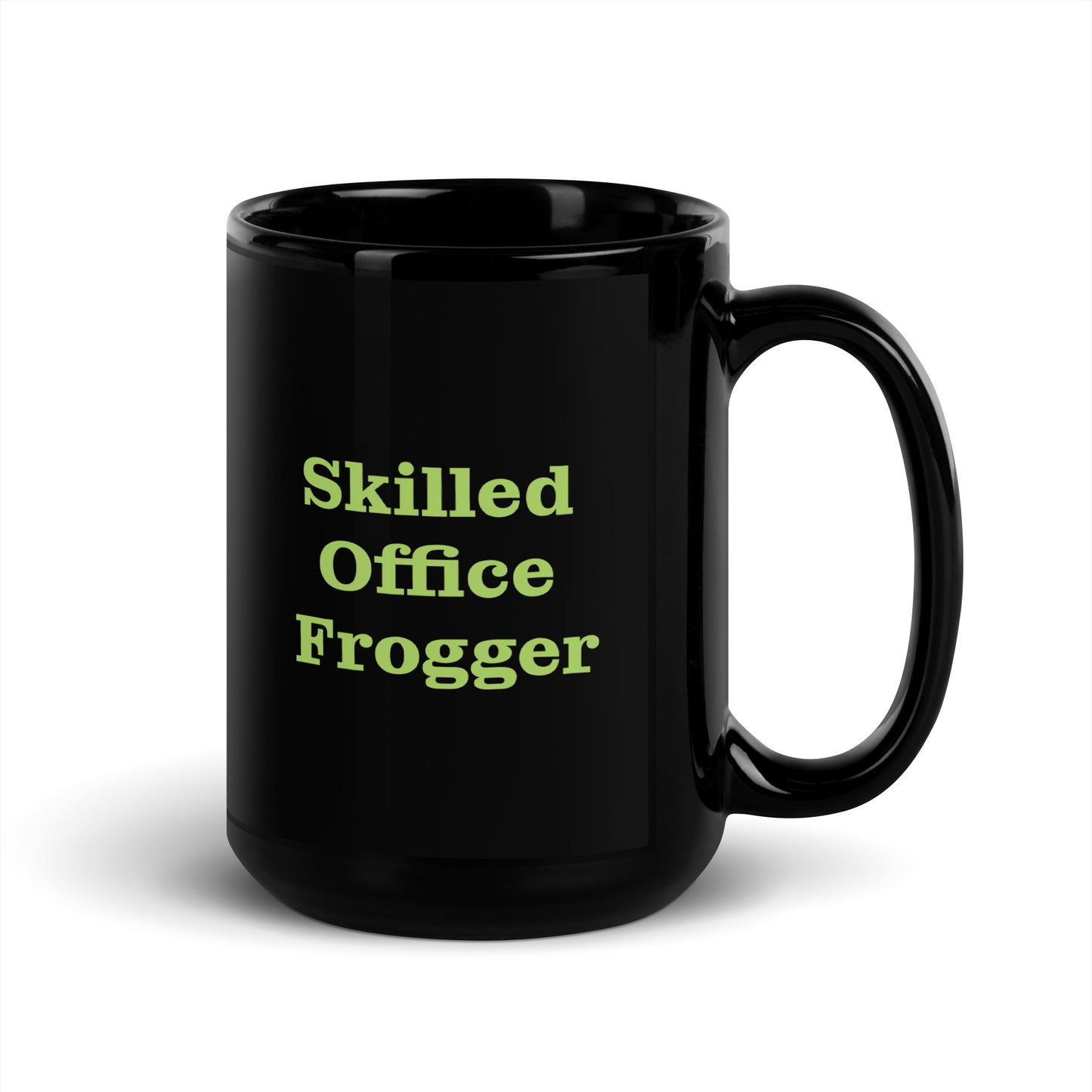Black mug with green text 'Skilled Office Frogger' on a white background