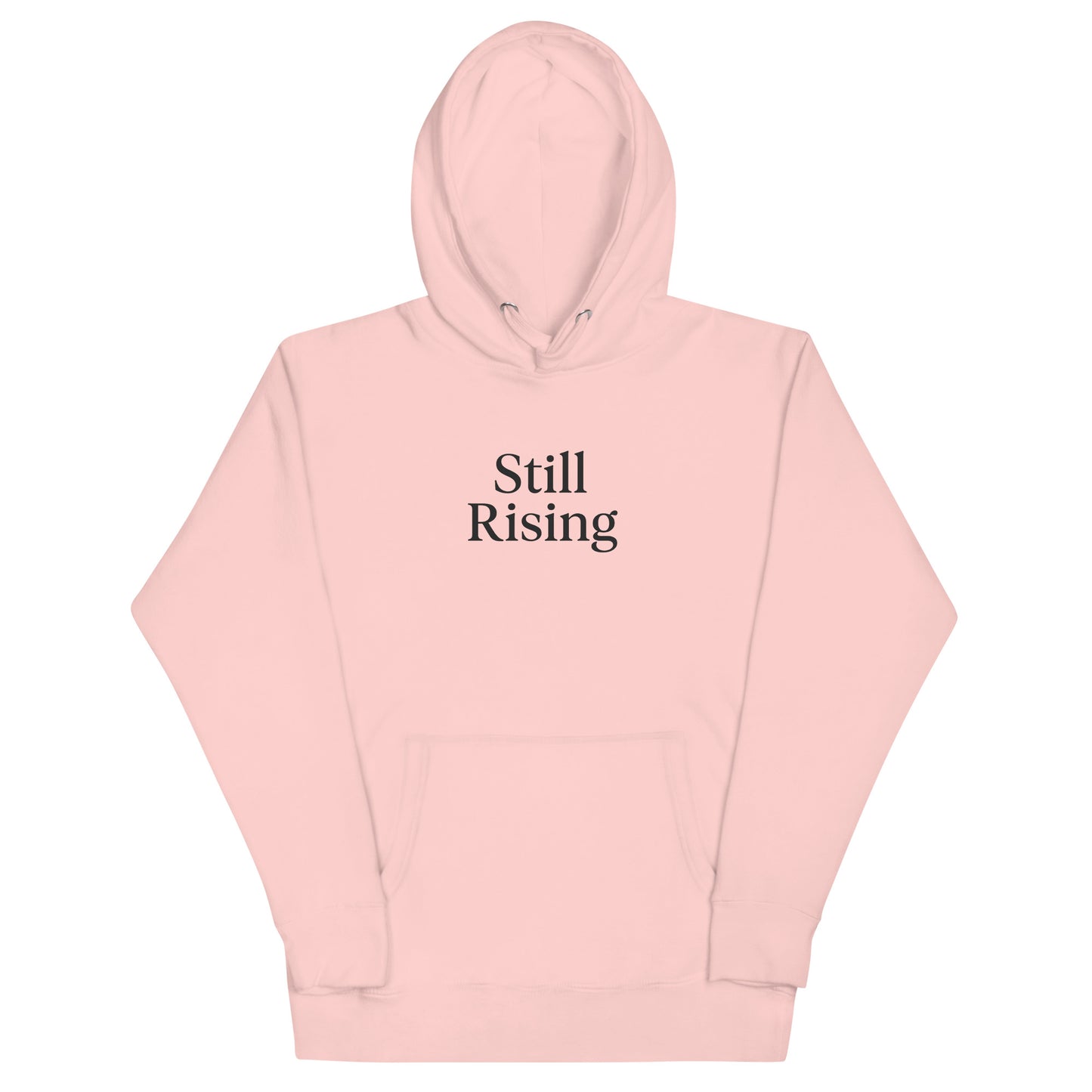 Pink hoodie with 'Still Rising' text on a white background