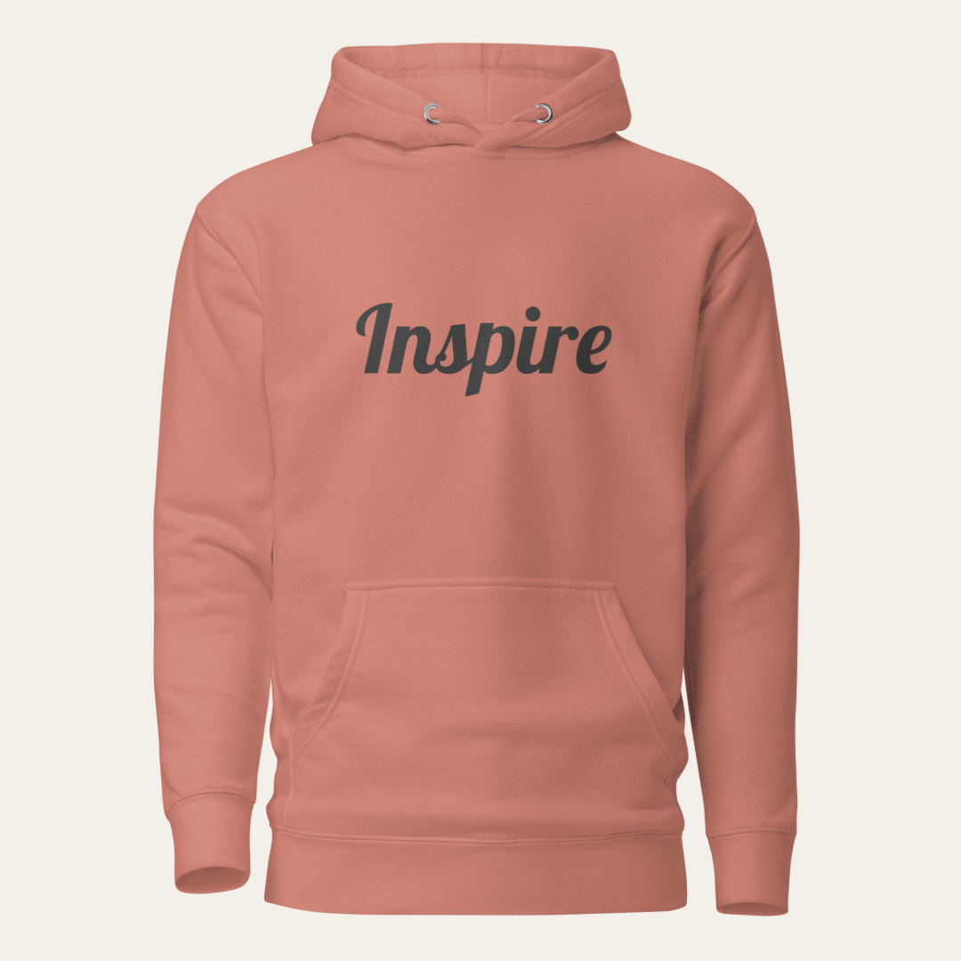 Dusty rose hoodie with the word "Inspire" on the chest.