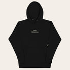 Black hoodie with 'Quiet Momentum' text on a white background