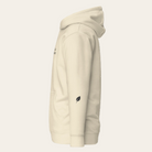Beige hoodie with a small logo on the chest against a white background
