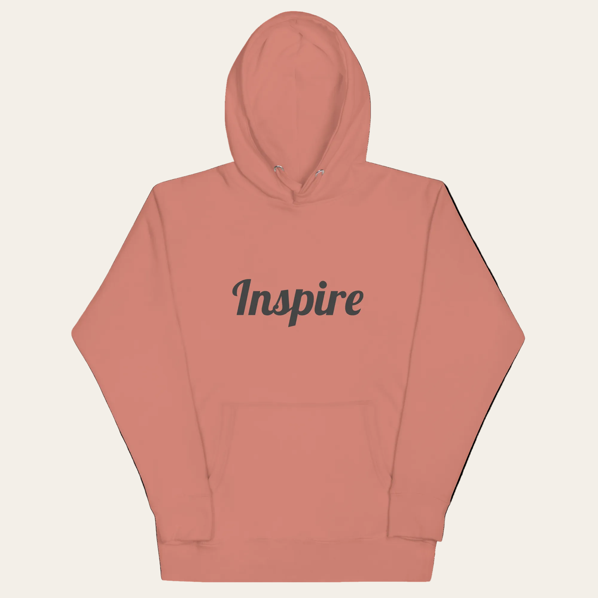 Coral hoodie with 'Inspire' text on a white background