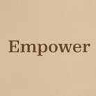Beige tote bag with 'Empower' text on a white background