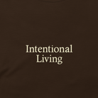 Brown t-shirt with 'Intentional Living' text on a white background