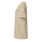 Beige t-shirt with a logo on the sleeve against a white background