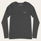 Dark gray long-sleeve shirt with 'Strong in the Quiet' text on a white background