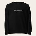 Black sweatshirt with 'Worn, Not Broken' text on a white background