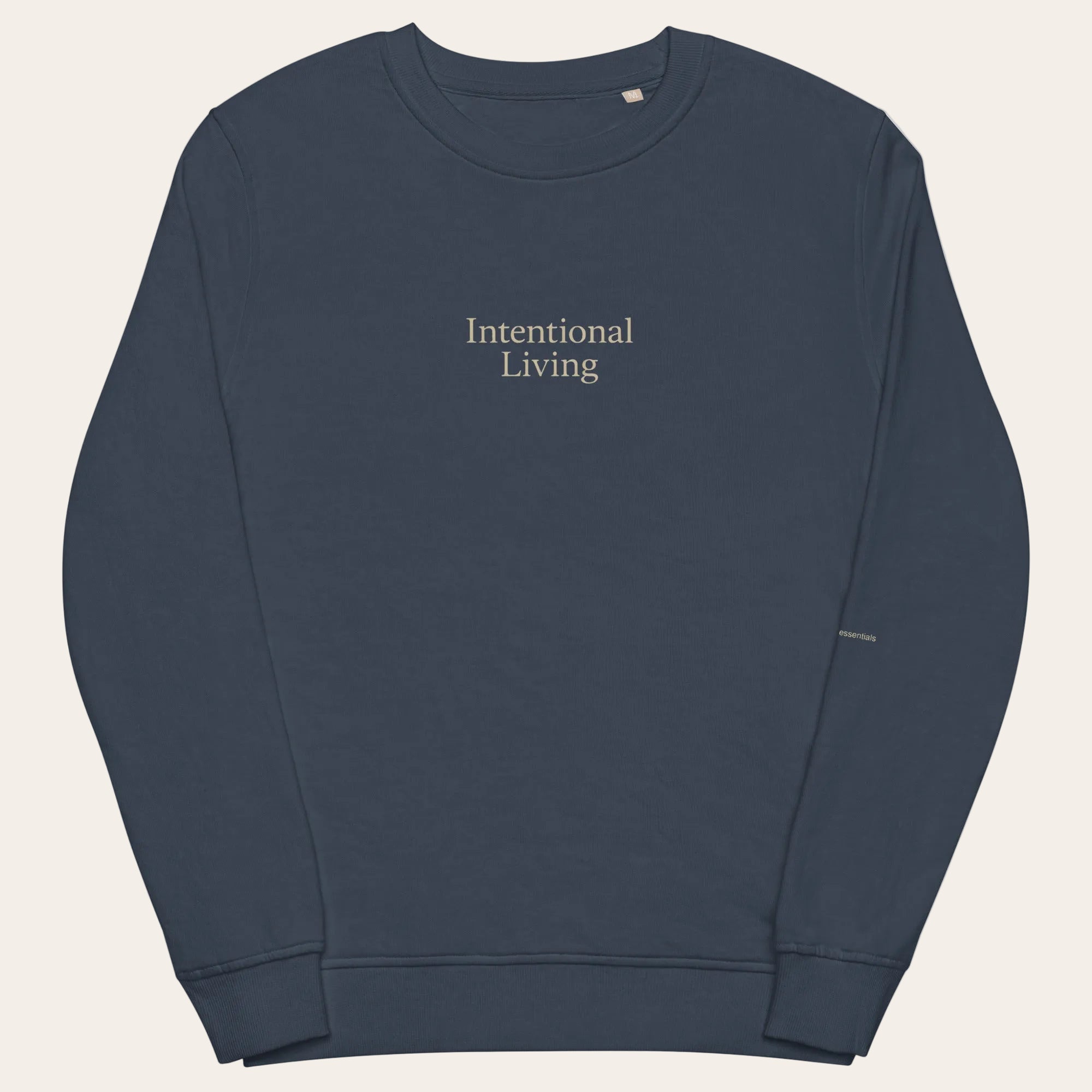 Navy blue sweatshirt with 'Intentional Living' text on a white background