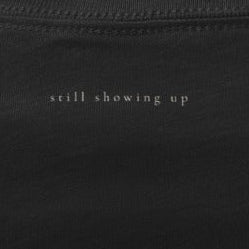 Black t-shirt on a white background