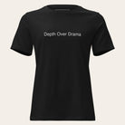 Black t-shirt with gold logo and text on a white background