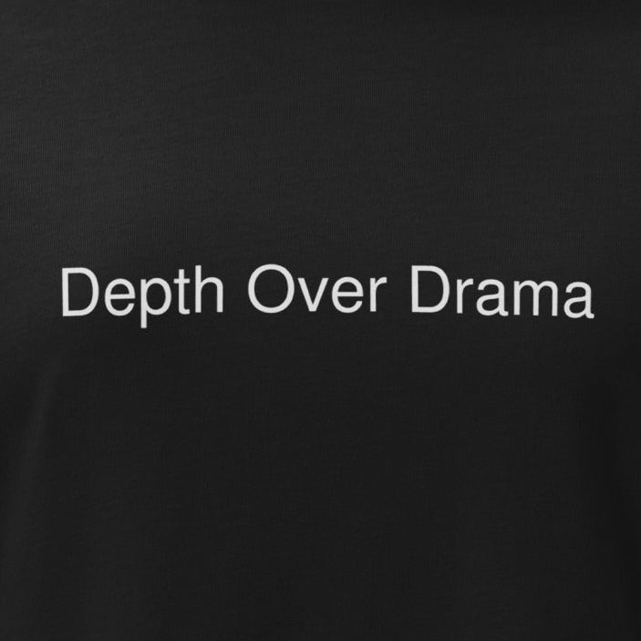 Black t-shirt with gold logo and text on a white background