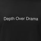 Black t-shirt with gold logo and text on a white background