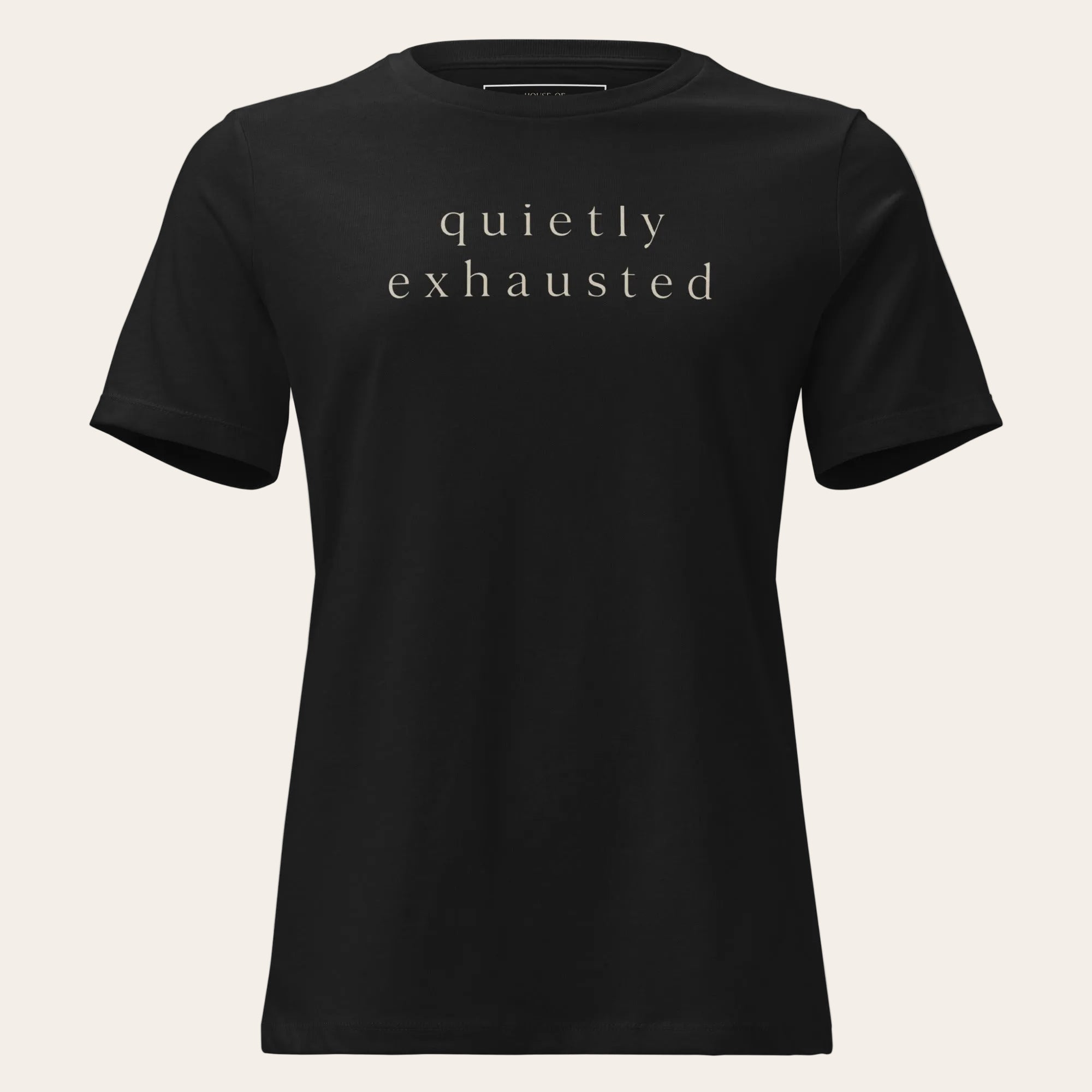 Black t-shirt with gold logo and text on a white background
