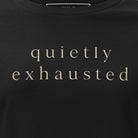 Black t-shirt with gold logo and text on a white background