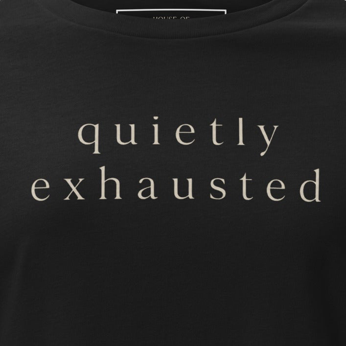 Black t-shirt with gold logo and text on a white background
