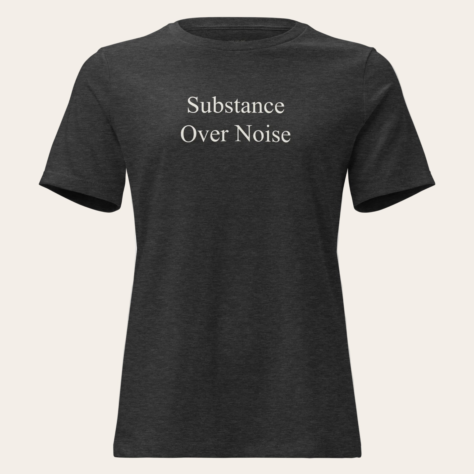 Black t-shirt with white text 'Substance Over Noise.' on a white background