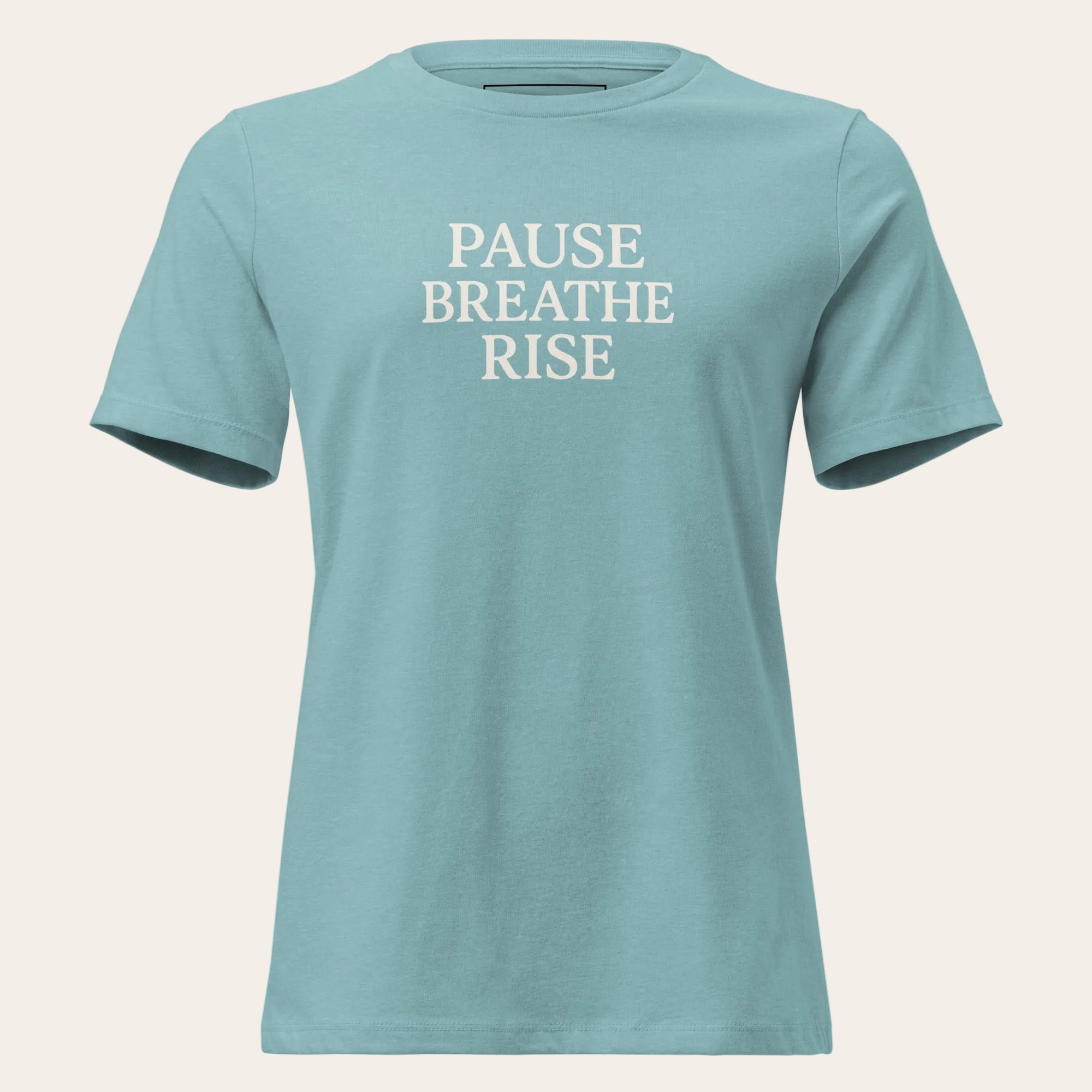 Teal t-shirt with 'PAUSE BREATHE RISE' text on a white background