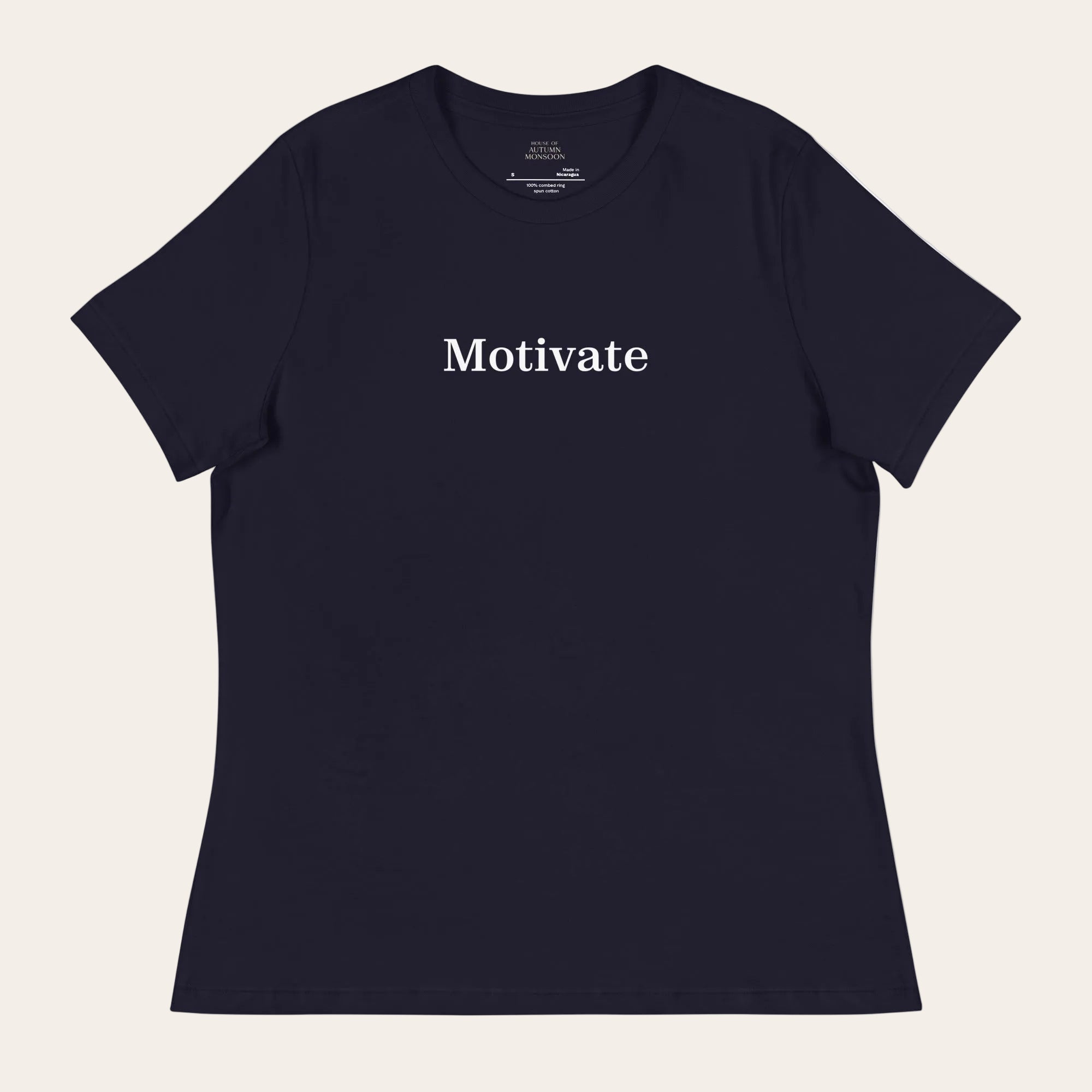 Black t-shirt with 'Motivate' text on a white background